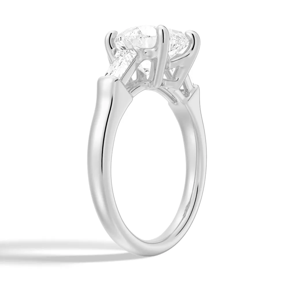 Heart-Shaped Engagement Ring with Tapered Baguette Stones